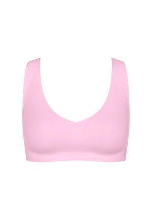 Lys rosa sømløs sports-bh med brede skulderstropper og rund udskæring, designet for komfort og støtte.