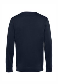 Tmavě modrá mikina s dlouhými rukávy, kulatým výstřihem a jednolitou texturou. Má žebrované manžety a lem, bez viditelných log nebo vzorů.