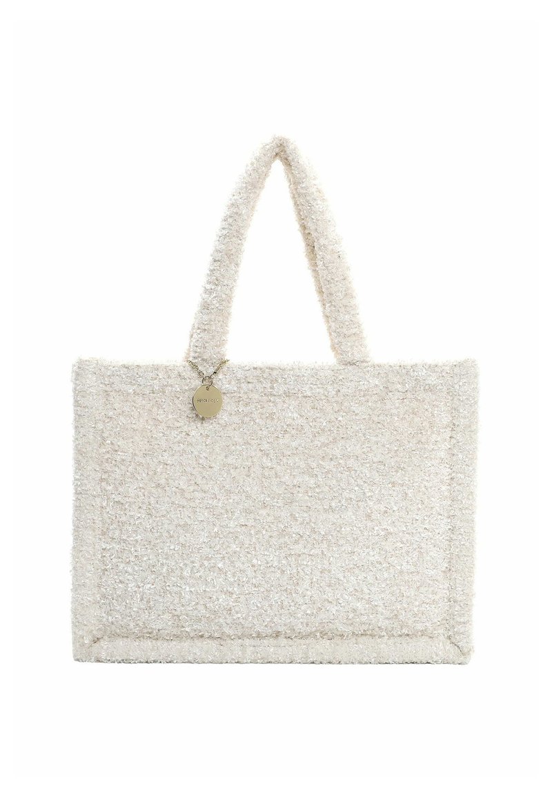 Minkštas, tekstūruotas kreminės spalvos tote krepšys su dviem rankenomis ir apvaliu metaliniu žymekliu. Stačiakampio formos su siūlėmis.