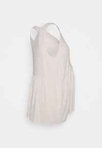 Camisola de alças bege clara feita de um tecido macio, com uma bainha franzida e alças largas, apresentando um corte descontraído e uma textura subtil.