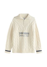 Pull en maille torsadée crème avec col demi-fermeture éclair, rayures bleu marine aux poignets et inscription brodée "1995 athletics club" sur le devant.