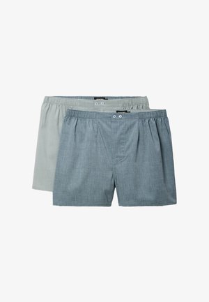 Deux paires de boxers pour hommes en coton, en gris clair et bleu, avec des ceintures élastiques et des fermetures à braguette avec boutons.