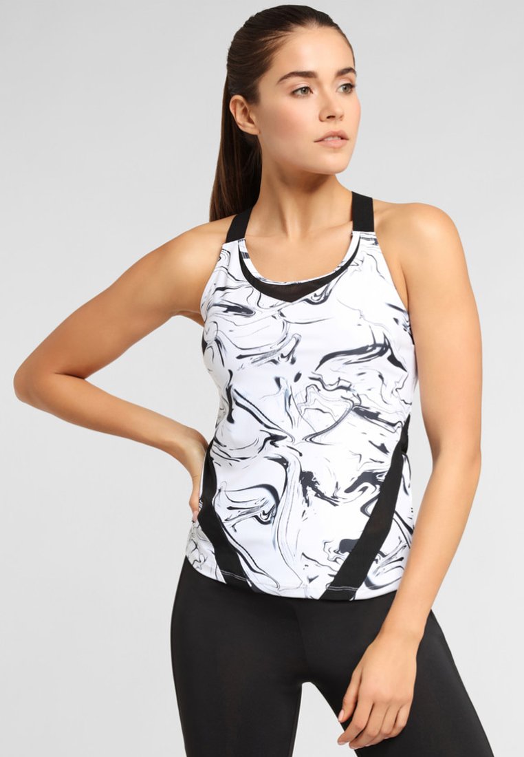 Marble-patterned tank top with white, black, and grey swirls. Features a racerback design and contrasting black side panels. Soft, stretchy material.
