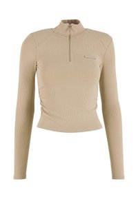 Bežinė ilgomis rankovėmis palaidinė su aukštu apykakle ir pusiau užtrauktuku. Funkcija yra prigijusi dizaino forma ir subtilus raukšlėtas paviršius. Maža akcentinė logo priekyje.