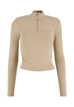 Béžový top s dlouhým rukávem, vysokým límcem a půl zipem. Má přiléhavý střih a jemnou žebrovanou strukturu. Malé akcentové logo na přední stran�ě.