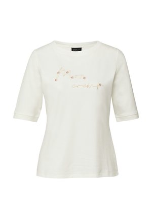 T-shirt blanc à manches courtes avec le texte « moon crew » brodé en cursive avec de petits détails floraux sur le devant.