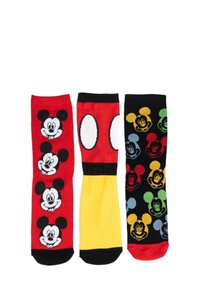 Tre paia di calzini colorati con design di topolini dei cartoni animati. Calzino rosso con due facce, centro giallo e calzino nero con molte facce in colori vivaci.