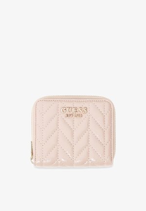 Pink quilted zip-around wallet with gold "GUESS EST 1981" logo on front and chevron stitching pattern.