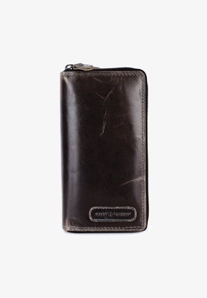 Brown leather wallet with a zipper closure, featuring a textured surface, contrasting stitching, and a branding label on the front.