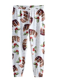 Lichte joggingbroek met een feestelijk patroon van leopardprint taarten en hulst op een witte achtergrond, met een elastische tailleband.