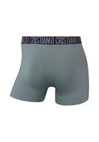 Herreboxershorts i lyst gråt stof med en sort linning, der har "CRISTIANO" gentaget i sølvskrift. Glat tekstur, tætsiddende design.