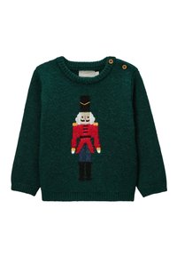 Pull en maille verte avec un motif de casse-noisette en rouge, noir, blanc et bleu, doté d'un col rond et d'une fermeture à deux boutons sur l'épaule.