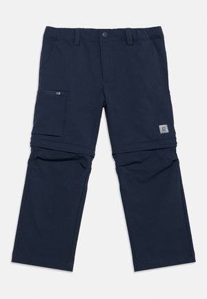 Tumši zili pārvēršami bikšu legingi ar rāvējslēdzēja noņemamām kājām un sānu rāvējslēdzēja kabatu, ar jostas cilpām un nelielu atstarojošu logotipu augšstilbā.