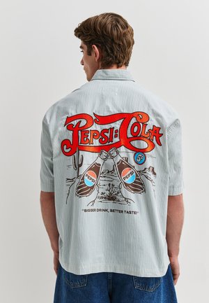Next, REGULAR FIT - PEPSI COLA STRIPE SHORT SLEEVE SHIRT  . - Camicia - blue
