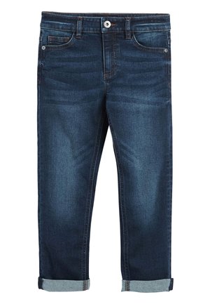 Jean denim bleu foncé à revers, cinq poches et coutures contrastées, fermeture par bouton à la taille, texture délavée sur les jambes avant.