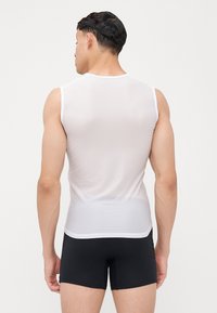 GripGrab ULTRALIGHT SLEEVELESS BASE LAYER - Unterhemd/-shirt - white