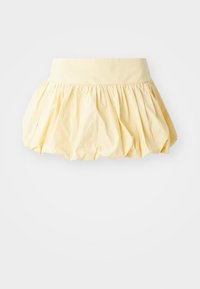 Yellow cotton skirt with a voluminous, gathered design and a wide waistband. Smooth texture and light fabric create a casual appearance.