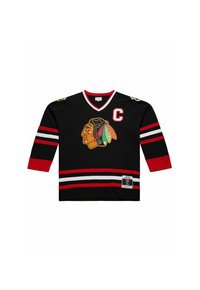 Maillot de hockey noir avec des rayures rouges et blanches, arborant un logo de tête amérindienne et un badge de capitaine rouge "C" sur la poitrine.