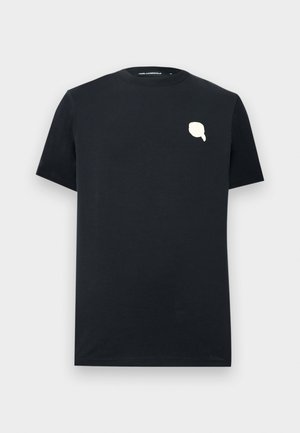 T-shirt noir à manches courtes avec col rond et un petit graphique blanc en forme de bulle de dialogue sur la poitrine gauche.