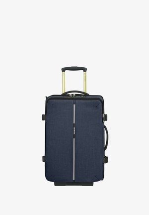 Navy blue softside suitcase with front zipper, two side handles, and extended yellow and black telescopic handle.