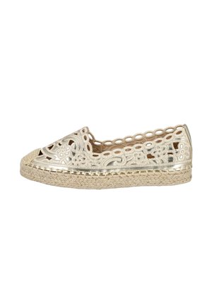 Alpargata plana beige con bordado floral recortado y suela de yute trenzado, con un borde en forma de ondas alrededor de la abertura.