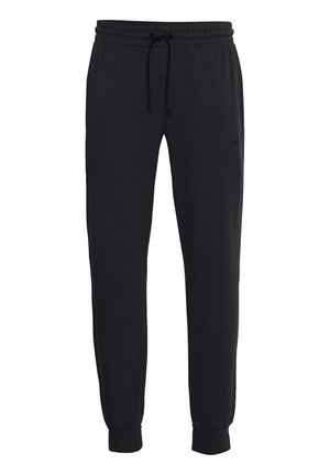 Fekete melegítőnadrág húzózsinórral a deréknál, szűkített lábakkal és bordás mandzsettával. Puha, rugalmas anyagból készült. Diszkrét logó az oldalon.