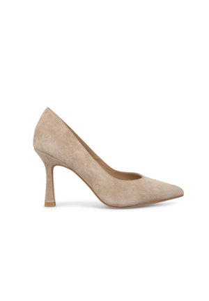 Pompe à talons aiguilles en suede beige, à bout pointu, texture lisse et talon conique effilé. Design épuré sans embellissements.