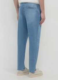 Calliope CON FUSCIACCA - Jeans Tapered Fit - blu denim chiaro