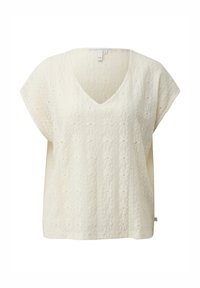 Top de punto de manga corta color crema con escote en V y patrón de cable trenzado floral, con un ajuste holgado y una pequeña etiqueta de la marca en el dobladillo.