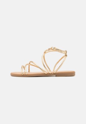Sandalias - gold-coloured