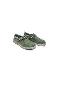 Green suede slip-on shoes with a rubber sole, featuring a padded collar, decorative laces, and a small accent bead near the lace.