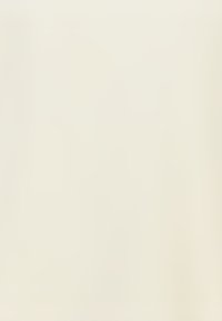 Effen roomkleurig oppervlak of achtergrond met een gladde, uniforme textuur zonder zichtbare patronen of details.