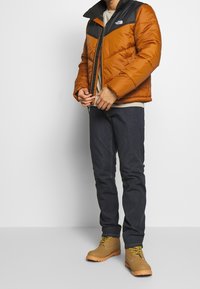 The North Face Zimní bunda - brown