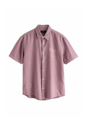 Kortærmet støvet pink skjorte med knapper og krave, med falmede "The Beatles" og solmotivtryk på brystet og nederst foran.