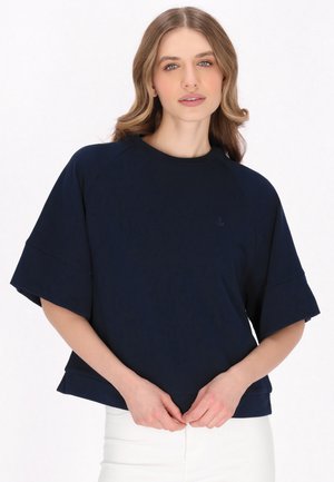 Felpa a maniche corte blu navy con collo a giro, vestibilità rilassata e logo dell'ancora discreto. Texture liscia con un design casual.