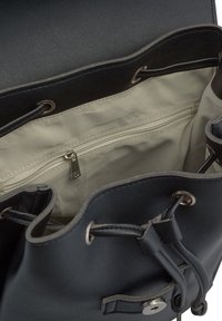 Black leather bucket bag with a drawstring closure, featuring an interior zip pocket and a beige lining. Hardware includes silver accents.