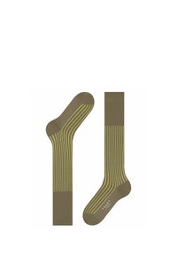 Calzini verde oliva con strisce verticali gialle, realizzati in un materiale liscio con una texture a coste e punta rinforzata.
