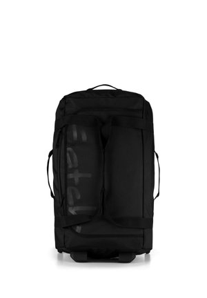 Black wheeled duffel bag with two large straps across the front and a handle on top and sides against a white background.