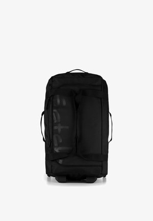 Black wheeled duffel bag with two large straps across the front and a handle on top and sides against a white background.