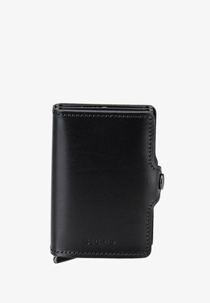 Kompakte schwarze Lederbrieftasche mit sichtbarer Naht, Metallknopfverschluss und geprägt"SECRID"-Logo unten vorne in der Mitte.