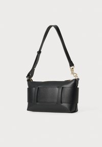 Black rectangular leather shoulder bag with adjustable strap, gold zipper, and stitched rectangular details on front.