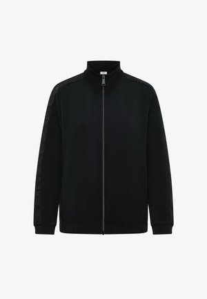 Musta vetoketjullinen takki, joka on valmistettu sileästä joustavasta kankaasta. Takissa on korkea kaulus ja teksturoitu kuviointi hihassa.