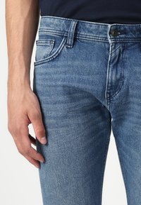TOM TAILOR DENIM TTPIERS - Traperice ravnih nogavica - used mid stone blue denim