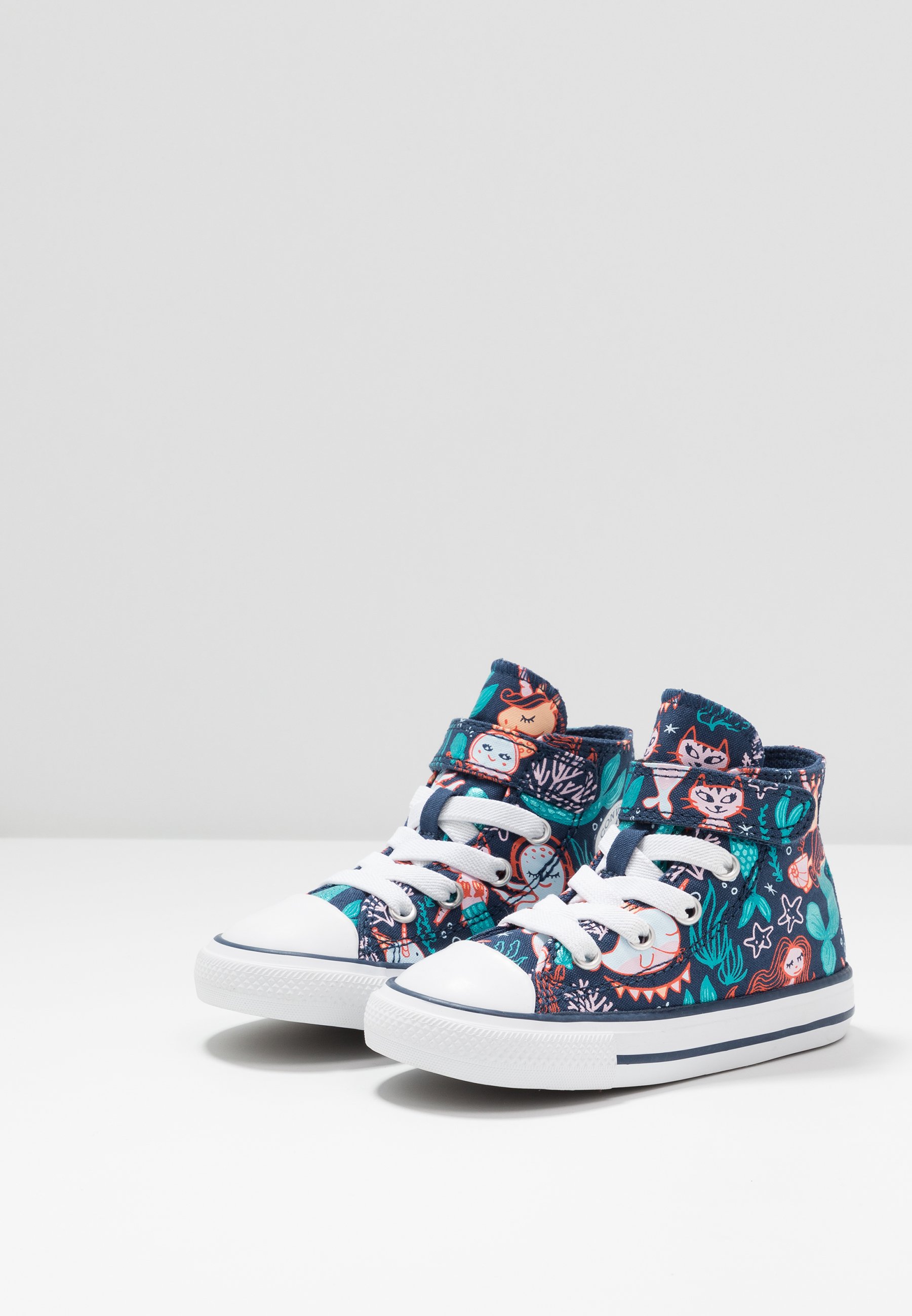 teal high top converse