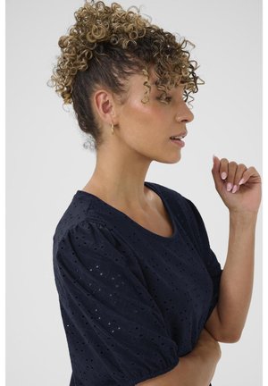 Marineblaue Bluse mit kurzen Puffärmeln, aus strukturiertem Stoff mit Lochmuster, mit weitem Ausschnitt und lockerer Passform.