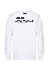 Sudadera blanca de manga larga con un estampado gráfico negro en la parte posterior que dice "GRAN TURISMO® EL SIMULADOR DE CONDUCCIÓN REAL."