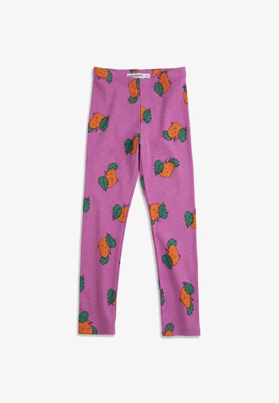 Leggings pour enfants violet côtelé avec un motif répétitif de carottes orange, avec des feuilles vertes et des visages souriants.