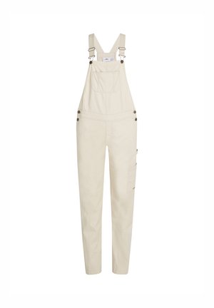 Pantalones de algodón beige con tirantes ajustables, bolsillo frontal y bolsillo lateral. Presenta herrajes de metal y un ajuste relajado.
