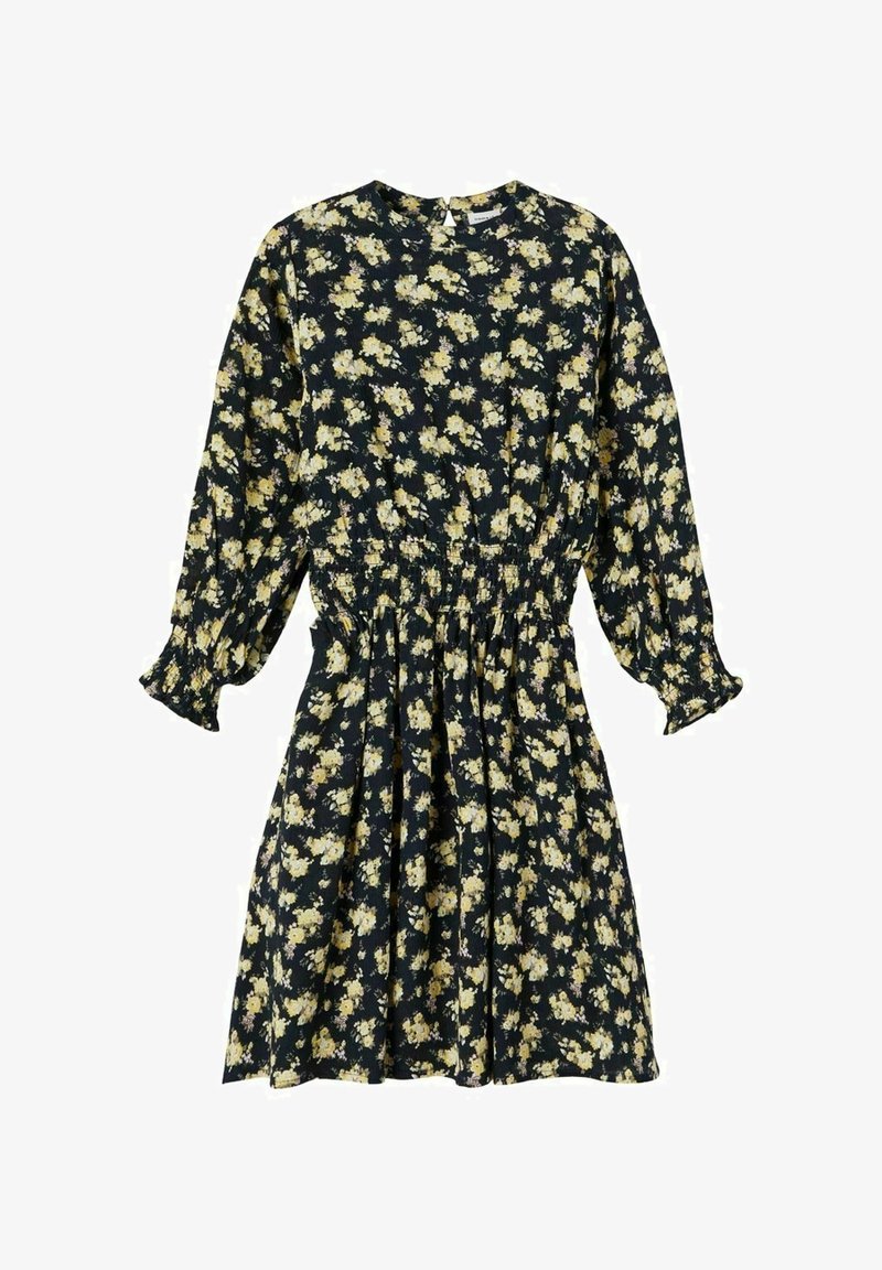 Robe noire à fleurs avec manches longues bouffantes, taille élastique et petit motif de fleurs jaunes et blanches.