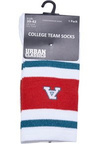 Calze da college rosse e bianche con strisce teal e logo "V" lavorato a maglia. Realizzate in un tessuto morbido, presentano un design aderente e a coste.
